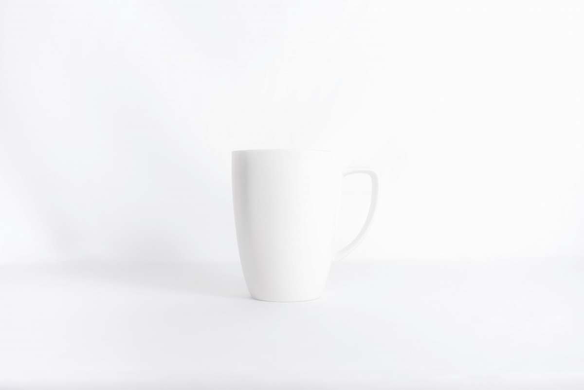 black-and-white white mug against white background grey