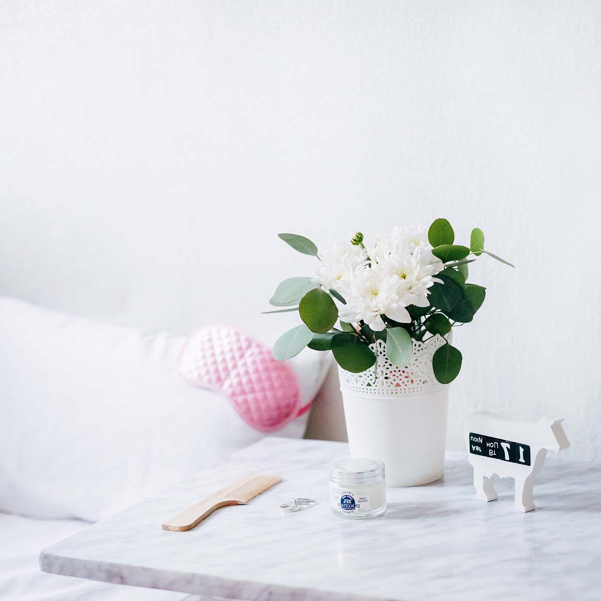 flower white petaled flowers in vase table