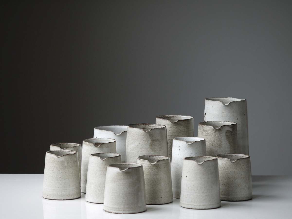 grey white pitcher lot turning earth ceramics