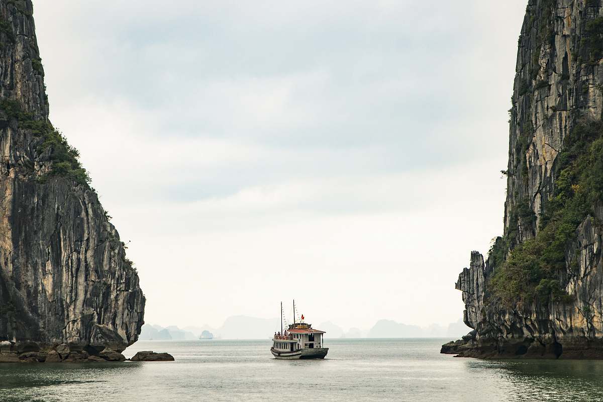 vietnam white watercraft on body of water boat