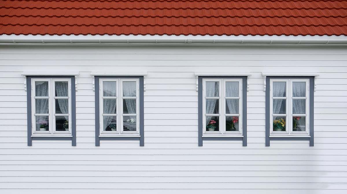 curtain closed white and red house windows windows