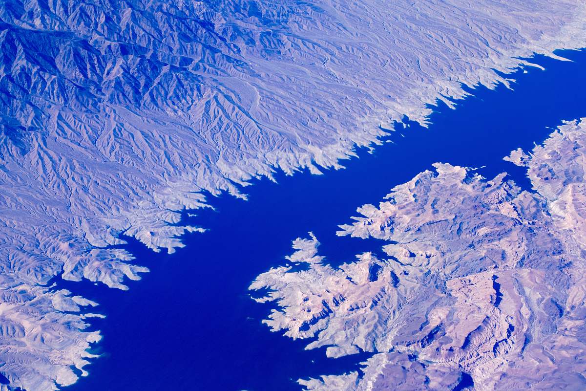 water aerial photo of body of water in between mountains grand canyon