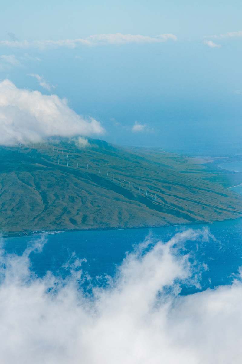 landscape aerial photography of electric windmill on landform cloud