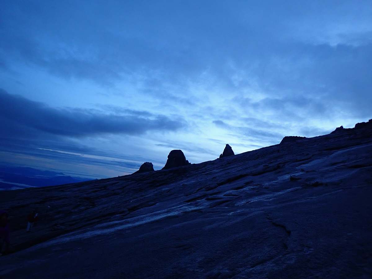 mountain aerial photography of rock formation ridge