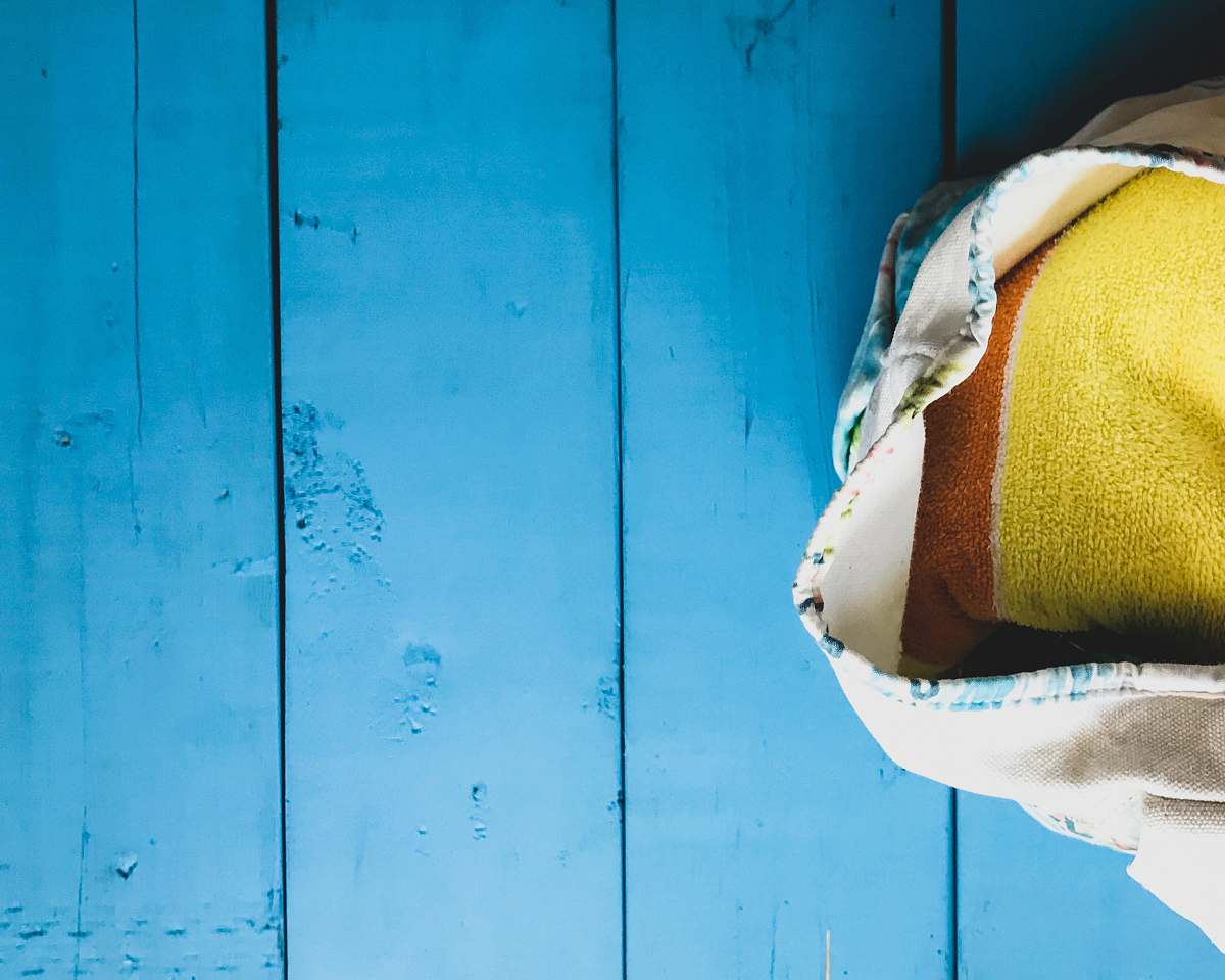 summer beige bag on teal board fort lauderdale
