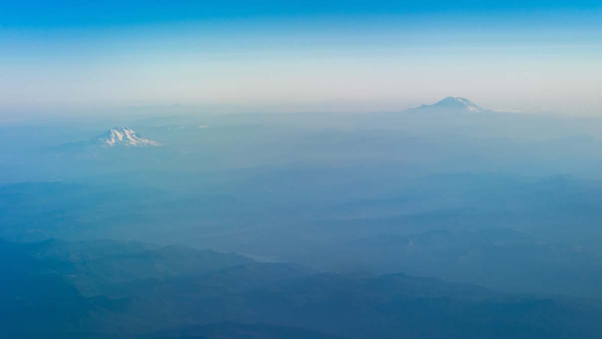 landscape bird's eye view of mountain tip aerial view