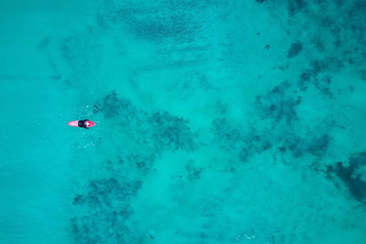 ramberg bird's eye view photography of person on body of water nordland