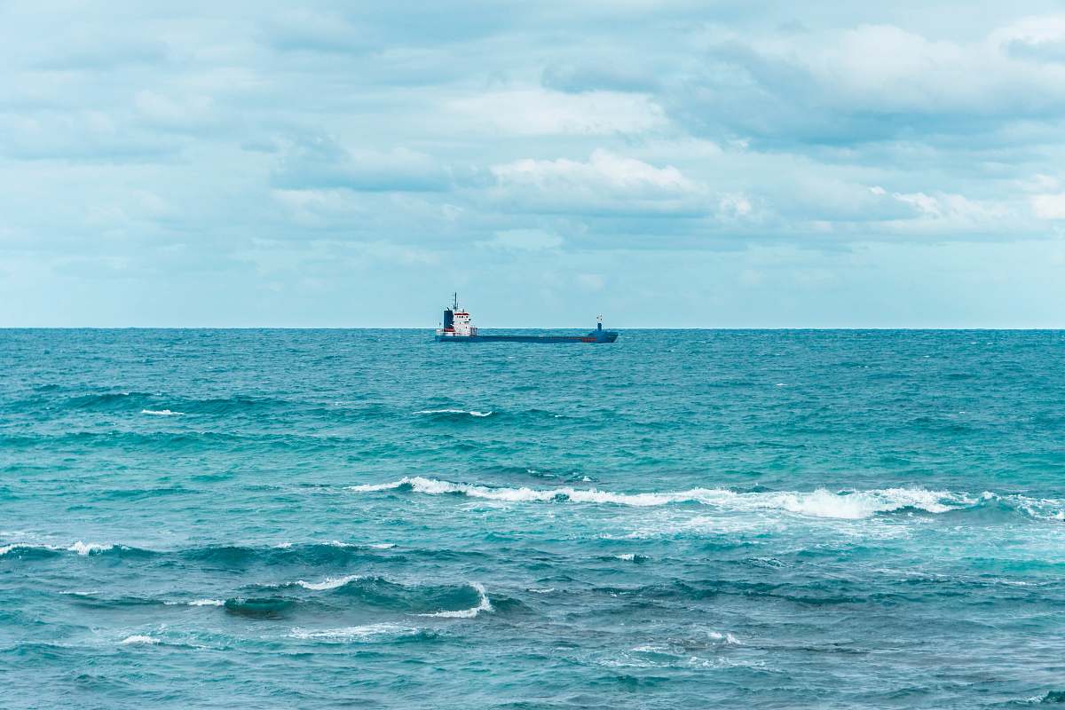nature black ship on body of water ocean