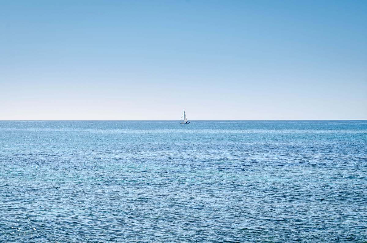 boat blue calm body of water transportation