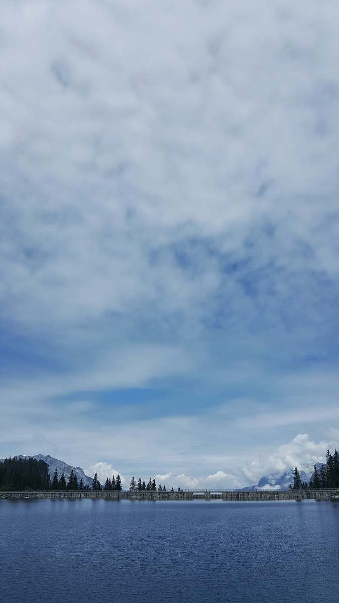 outdoors blue lake under white clouds nature