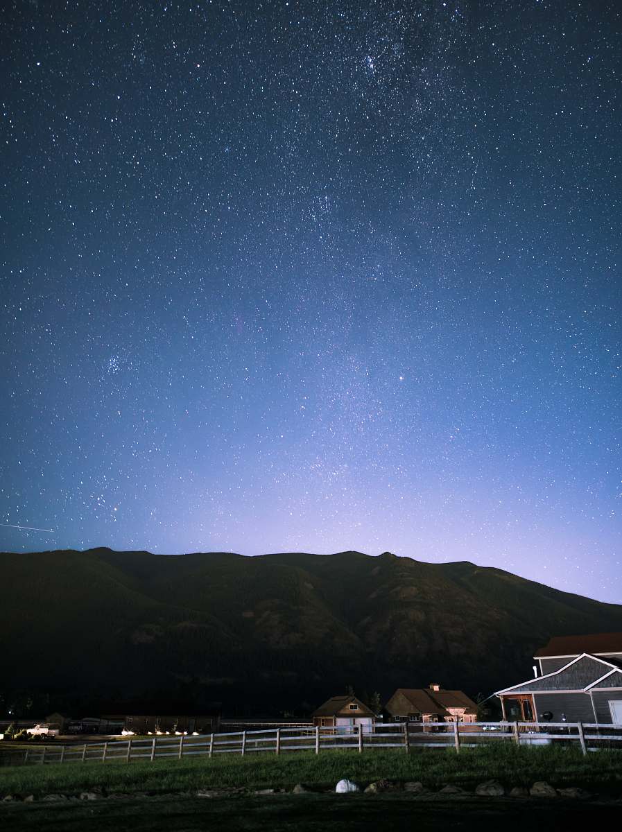 night brown houses in front of hill under starry night android wallpapers