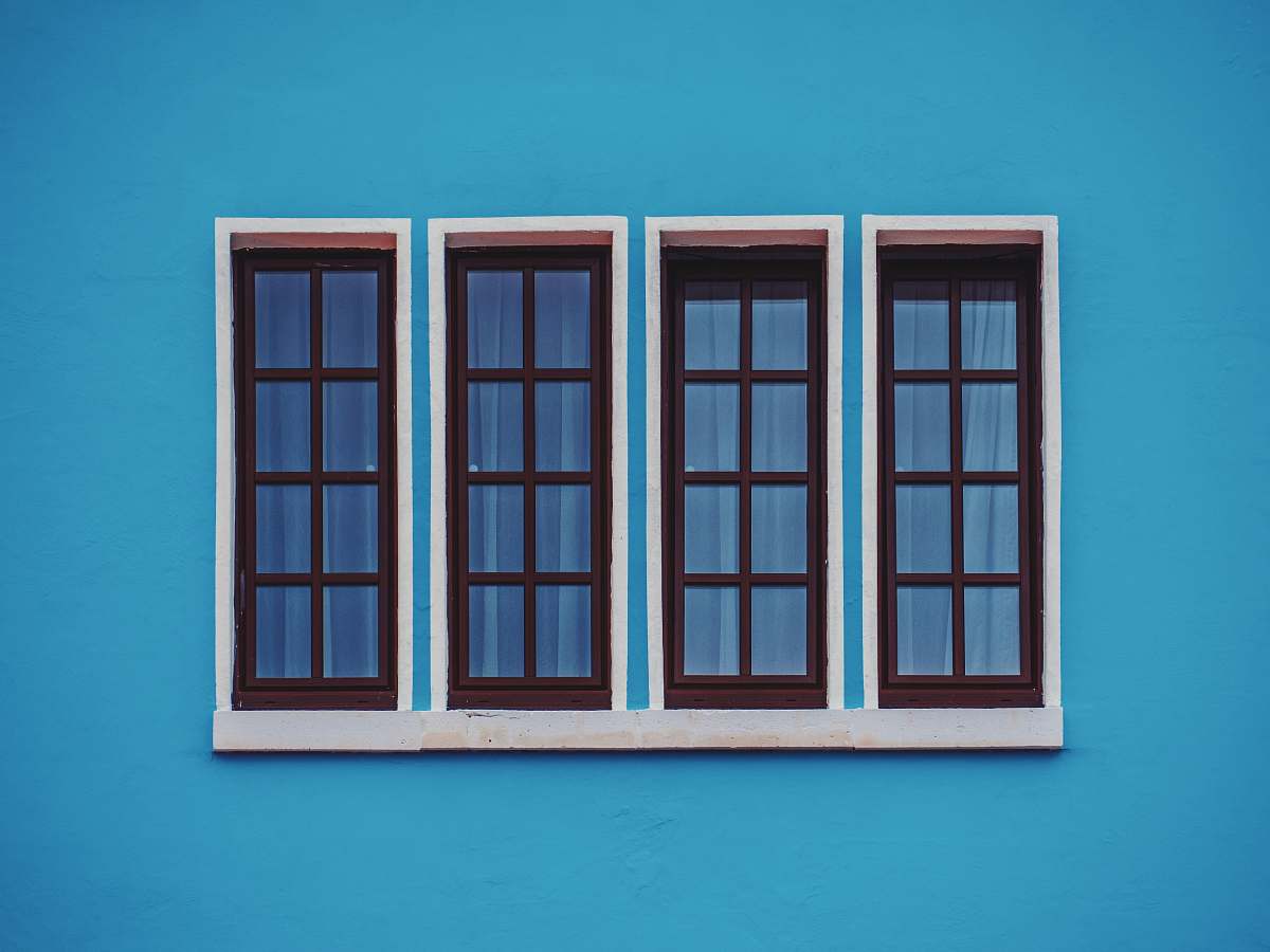 window clear glass windows in blue concrete wall cologne