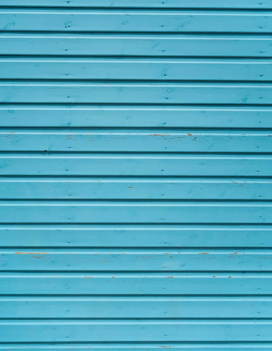wall close up photo of teal shutter door bench