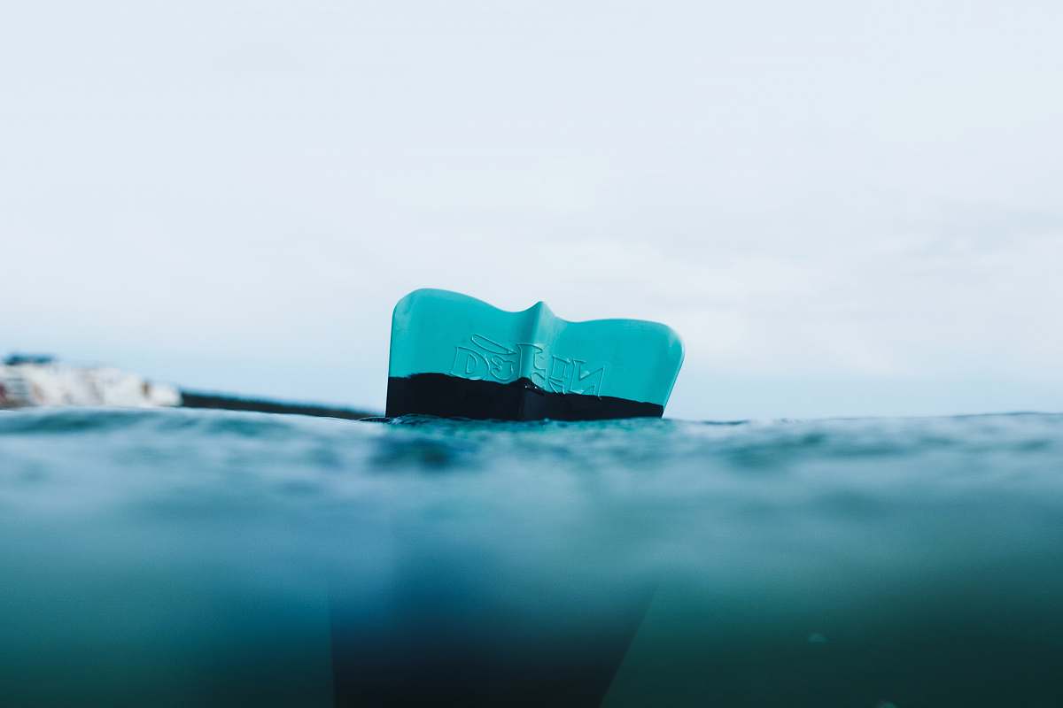 water close-up photography of calm water flipper