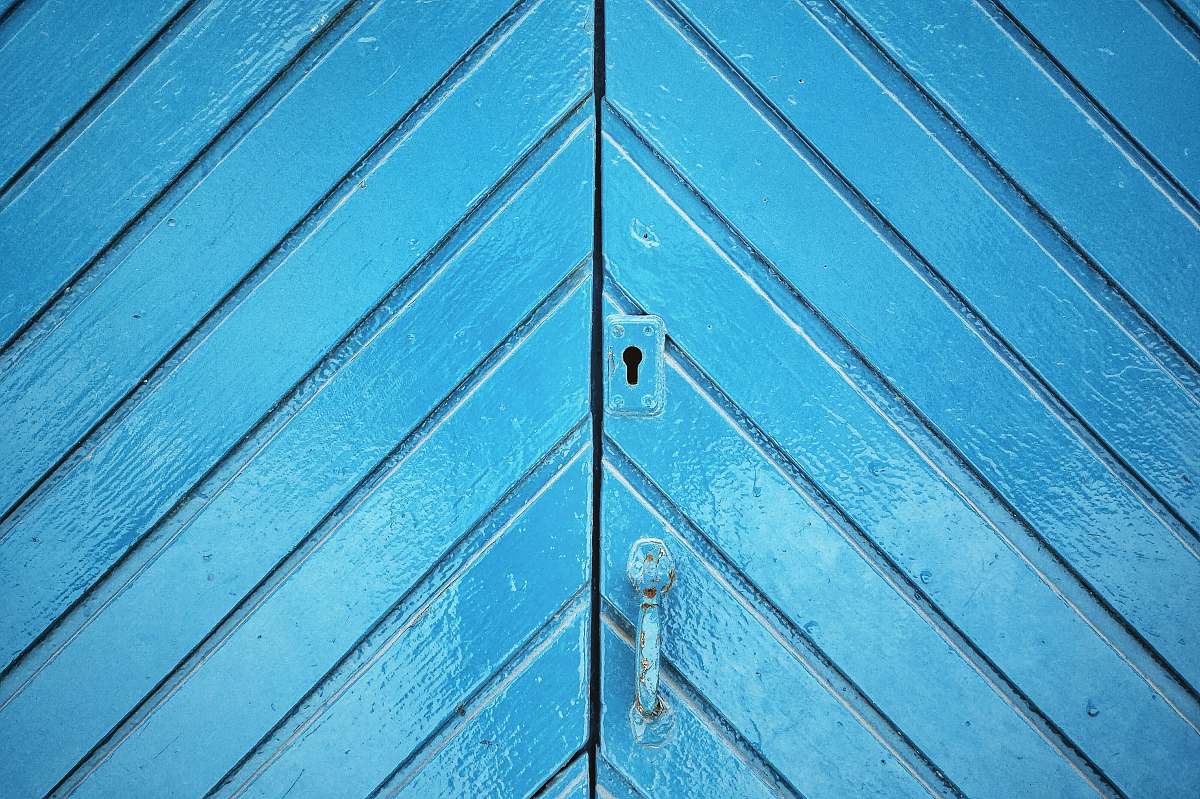 wood closed blue door barcelona