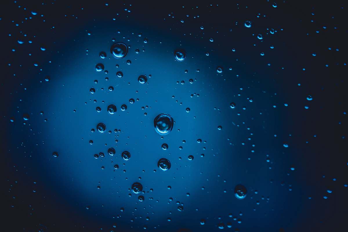 droplet dew photography with blue background teal