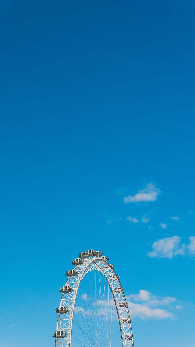 london Ferris wheel during day amusement park