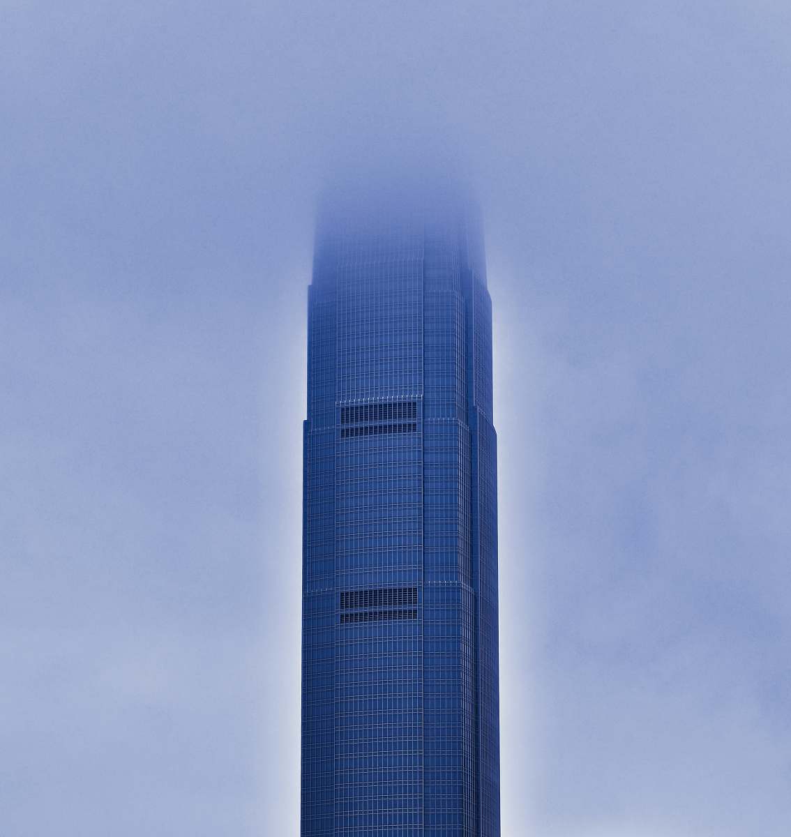 building gray building under gray sky city