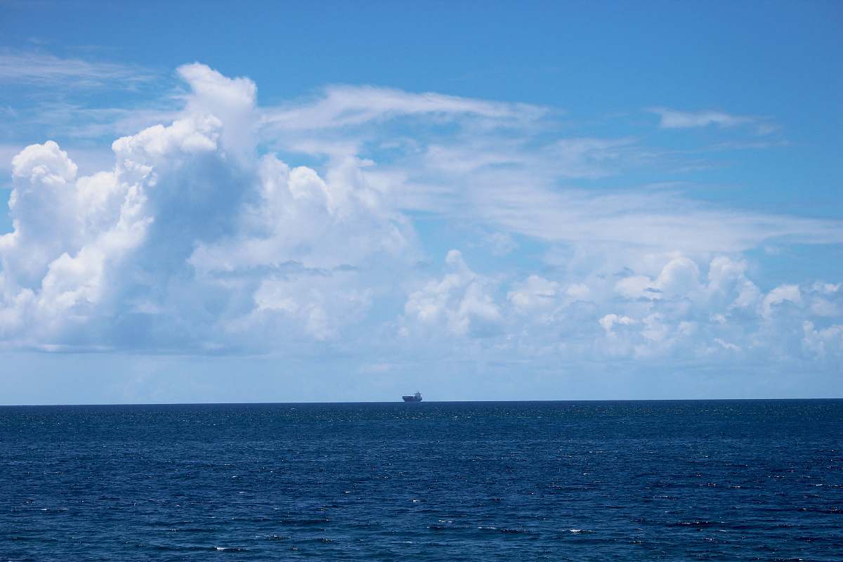 nature gray cruiser ship in the middle of ocean outdoors