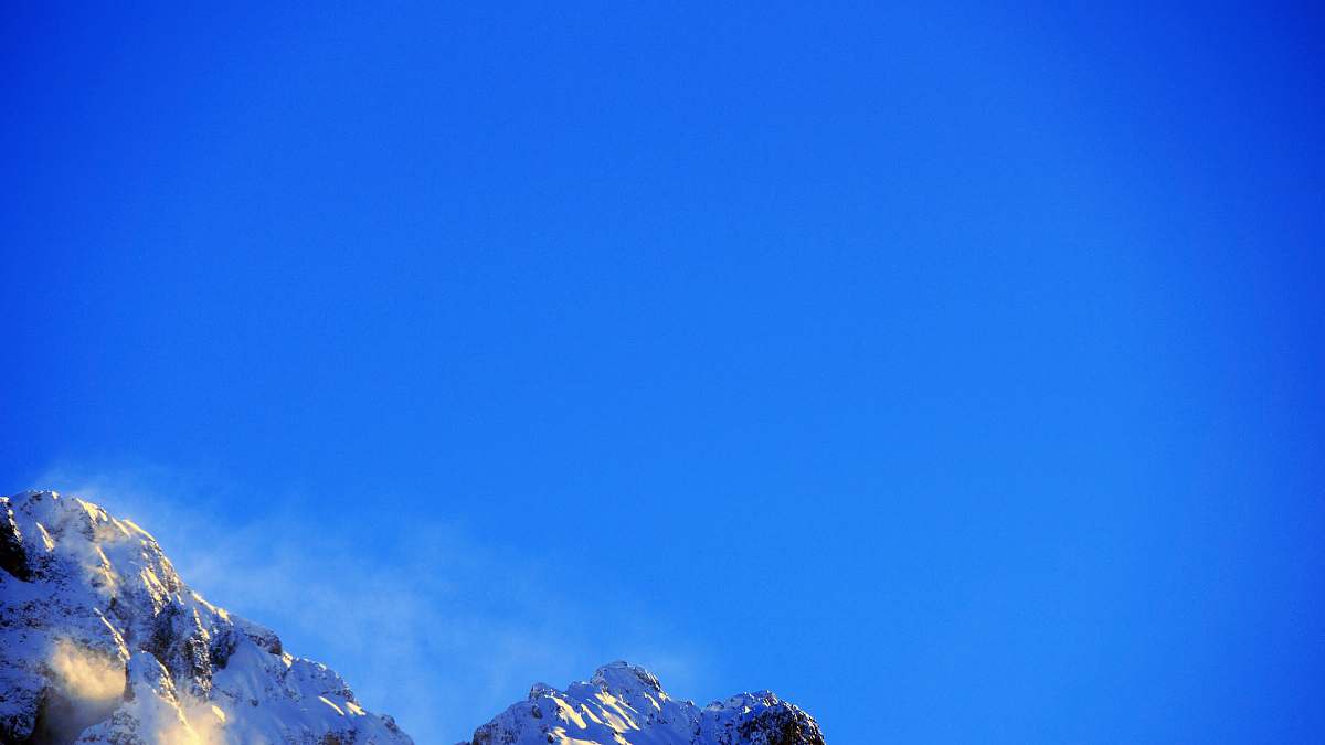 nature gray mountain under blue sky outdoors