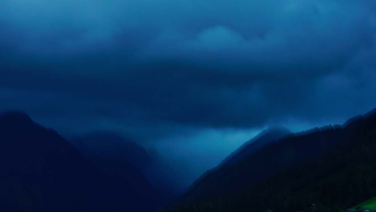 schladming grey clouds under mountain austria