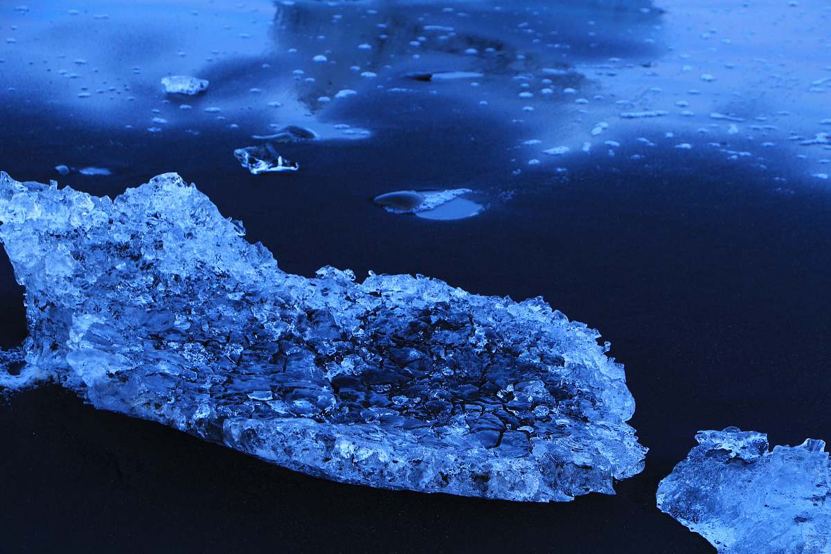 water ice berg on body of water ice