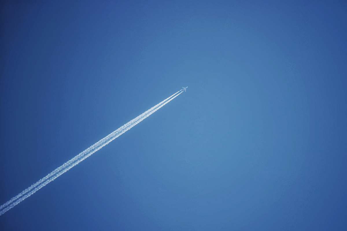 nature jet plane in the sky during daytime sky