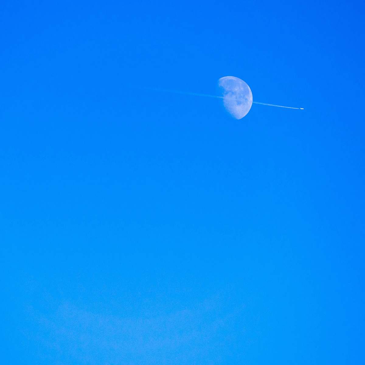 nature jet smoke over moon outdoors