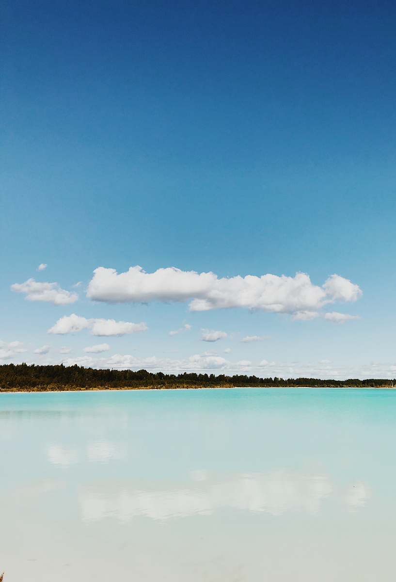 cloud landscape photo of island under cloudy sky ocean