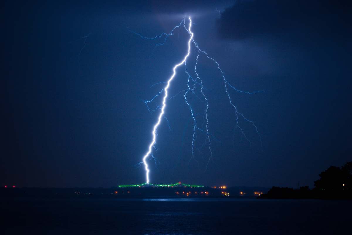 lightning lightning struck on city at night time thunderstorm