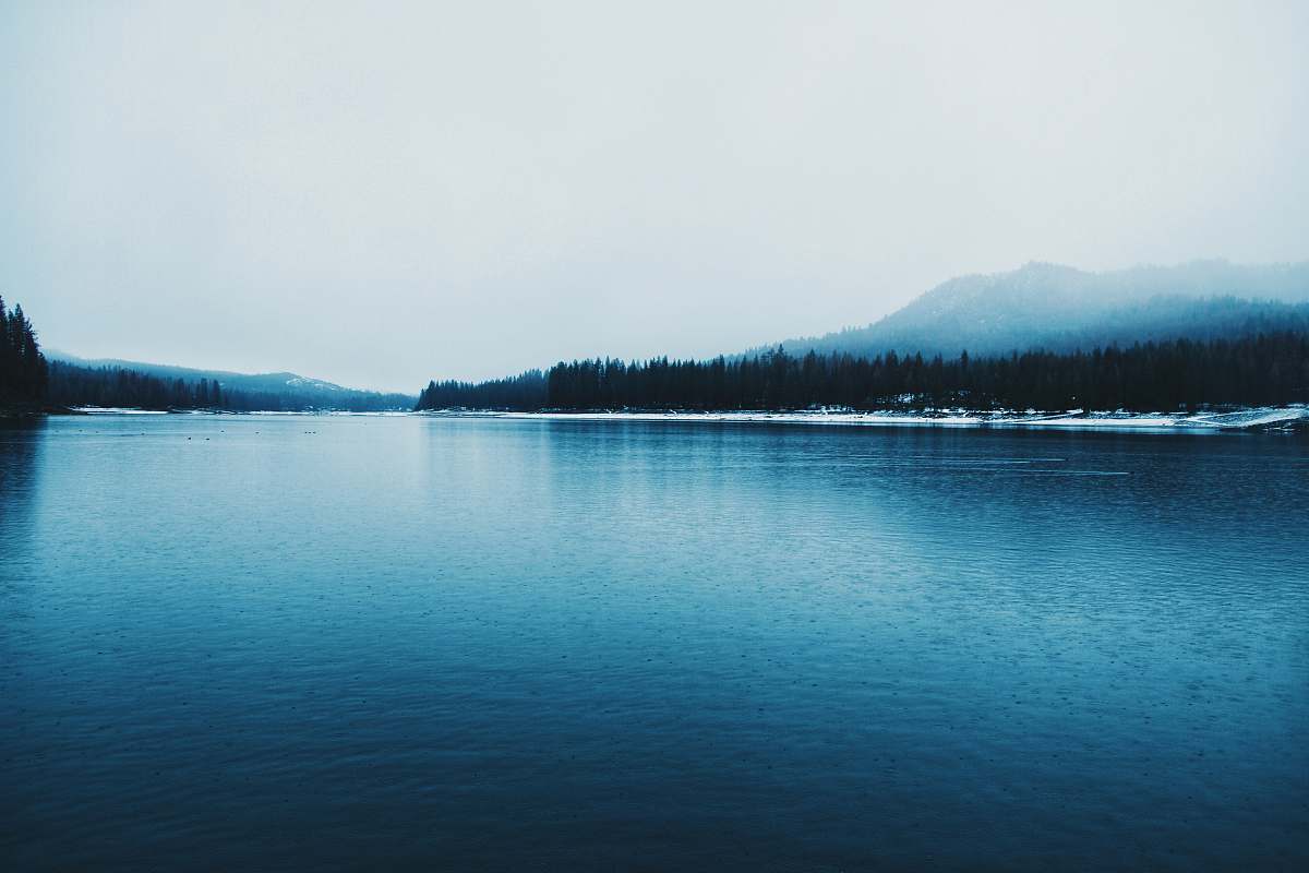 lake long exposure photo of body of water background