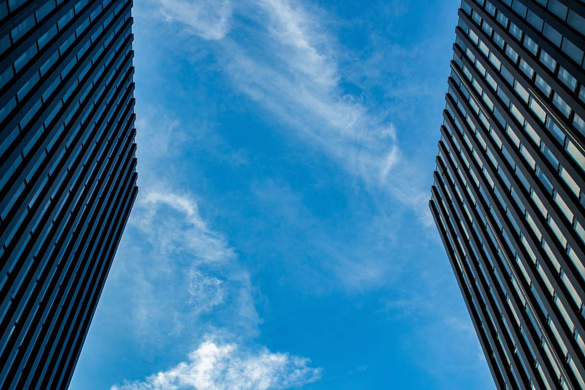 building low-angle photo of buildings during daytime office building