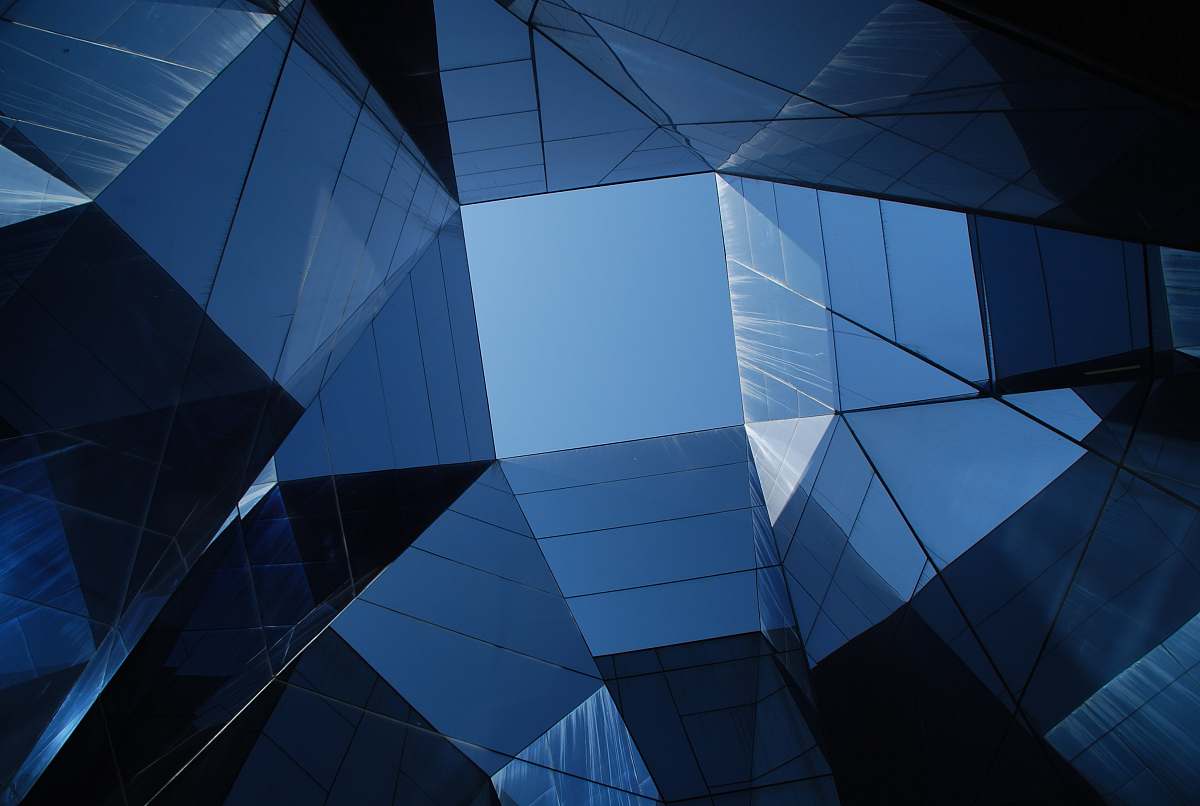building low angle photo of curtain wall building architecture