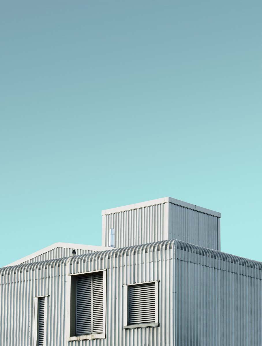 slough low angle photo of gray building architecture
