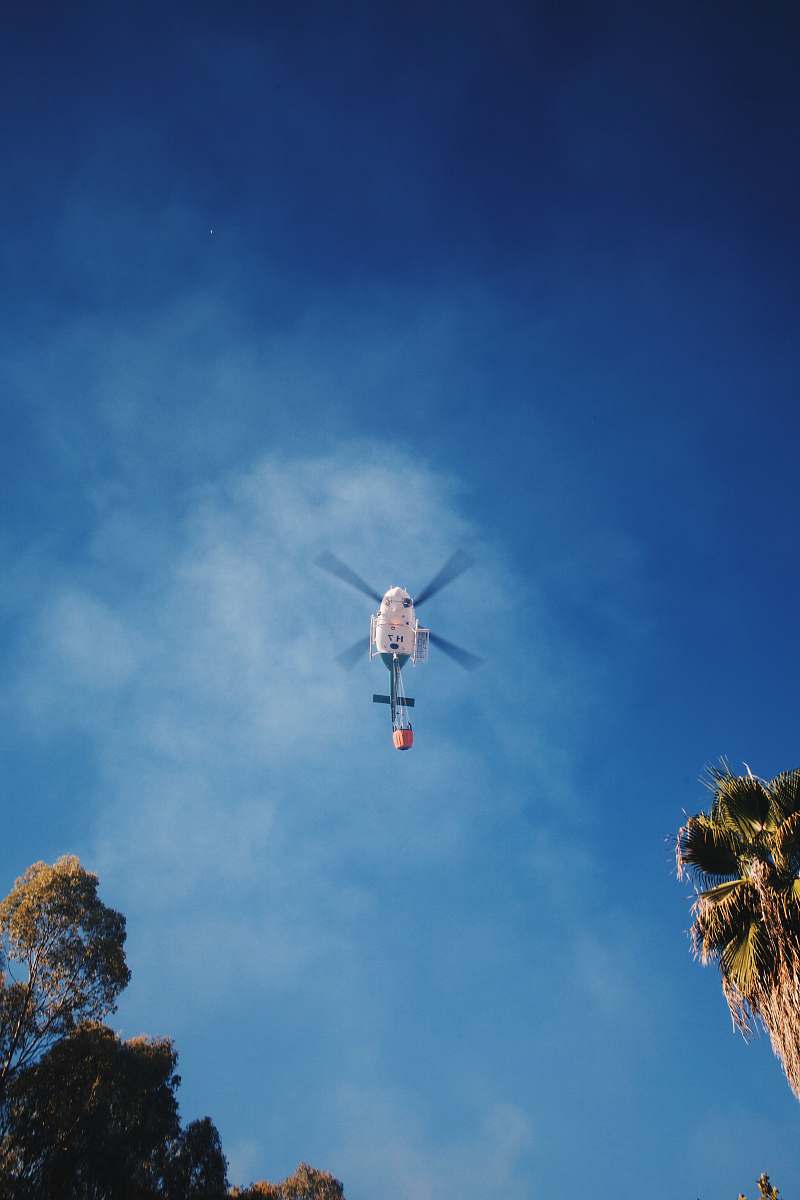 spain low angle photography of helicopter sky