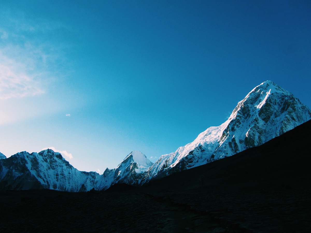 mountain low angle photography of mountain covered by snow snow