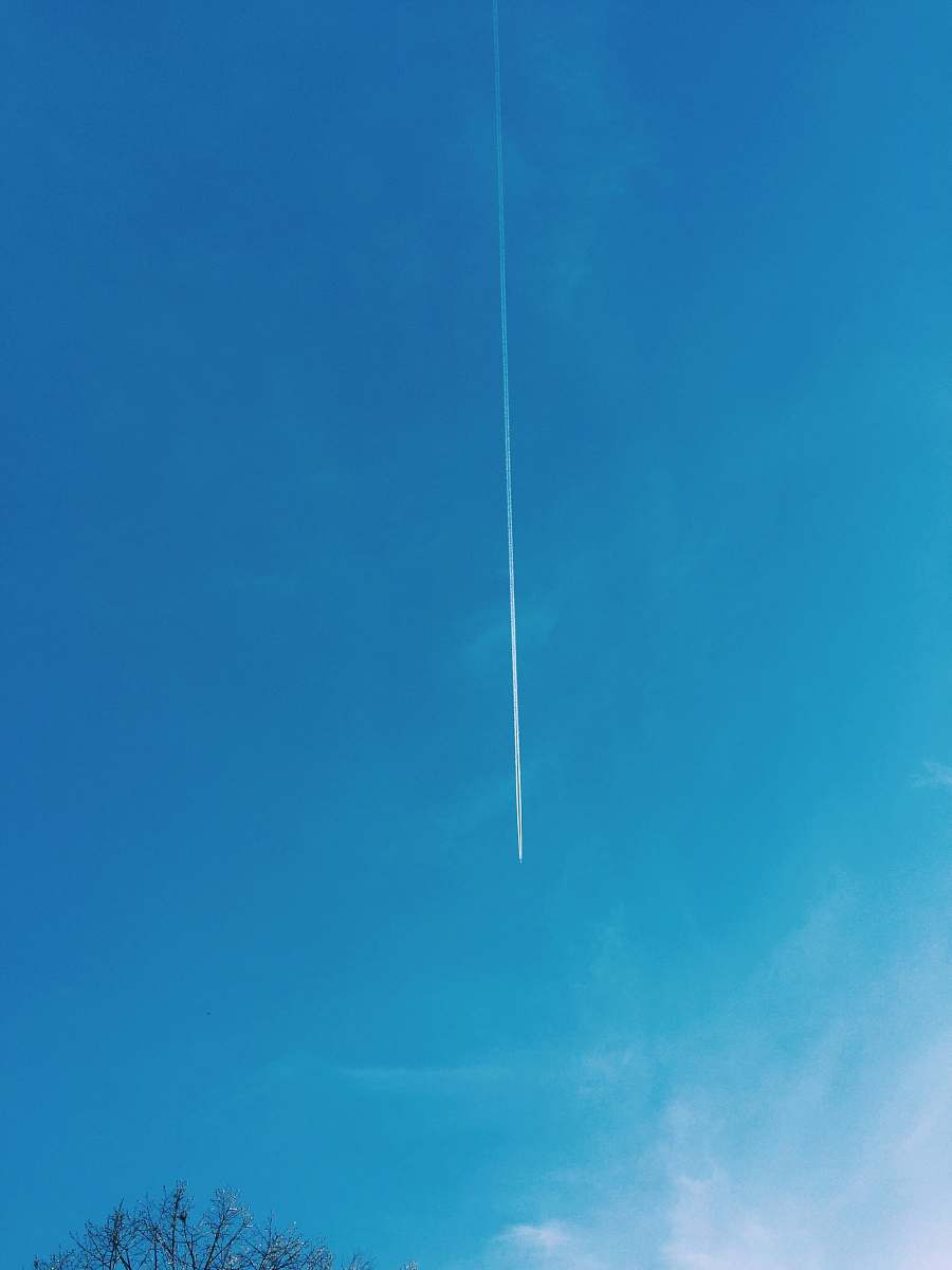sky low angle view of plane contrail nature