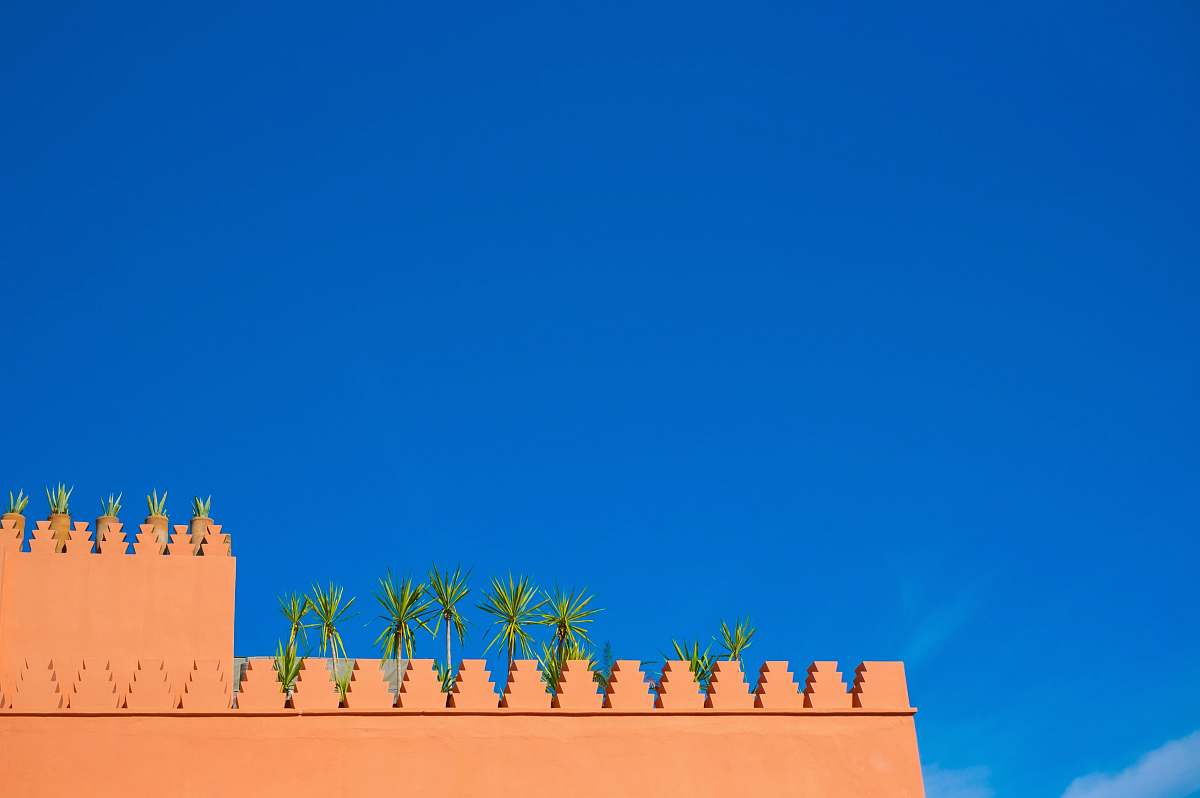 architecture lowangle photo of brown concrete wall during daytime morocco