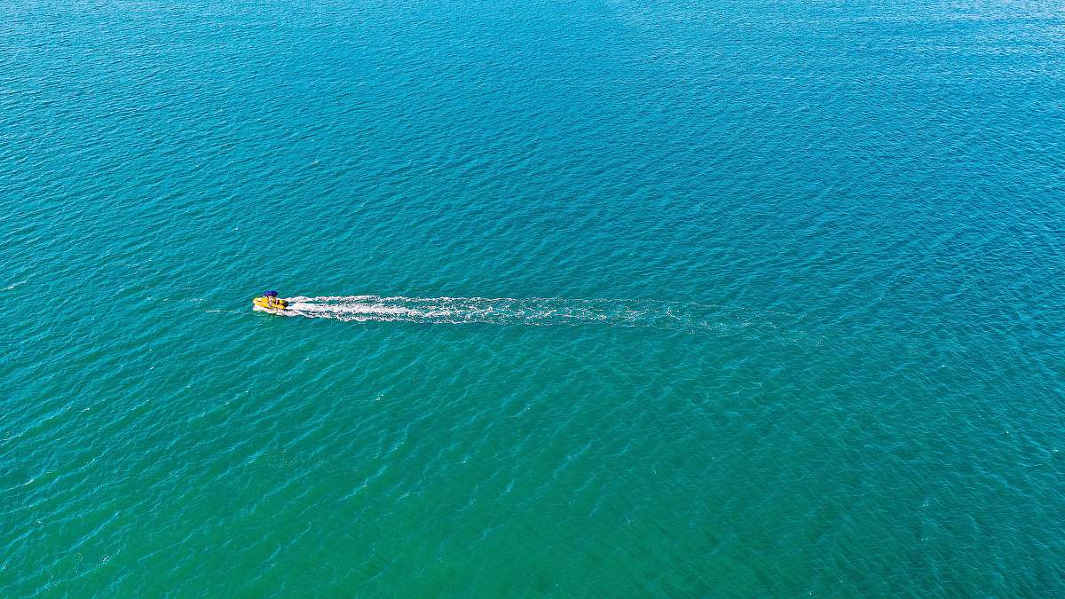 nature motorboat sailing on sea during daytime ocean