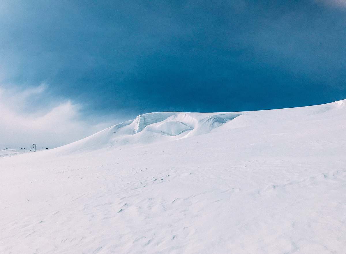 mountain mountain covered by snow snow