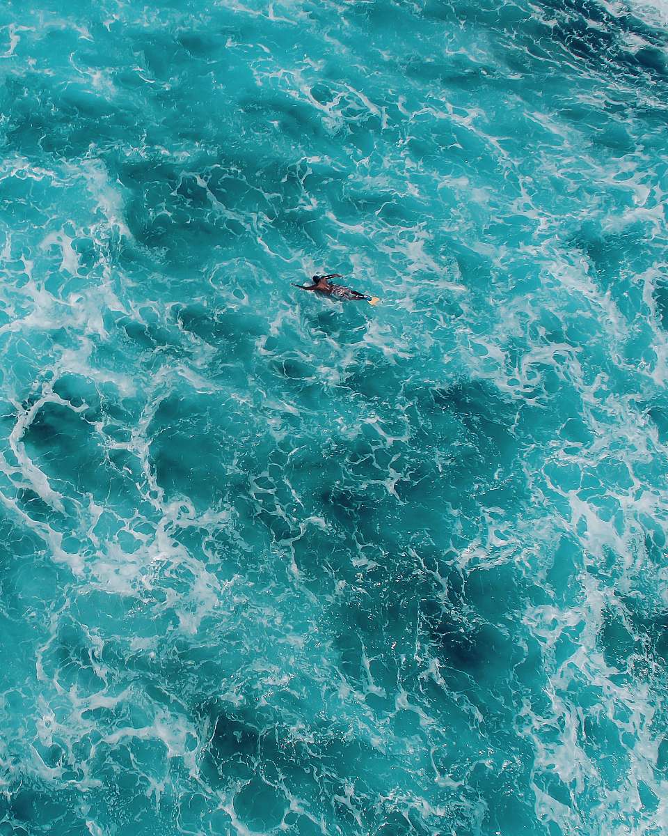 water person on body of water maldives