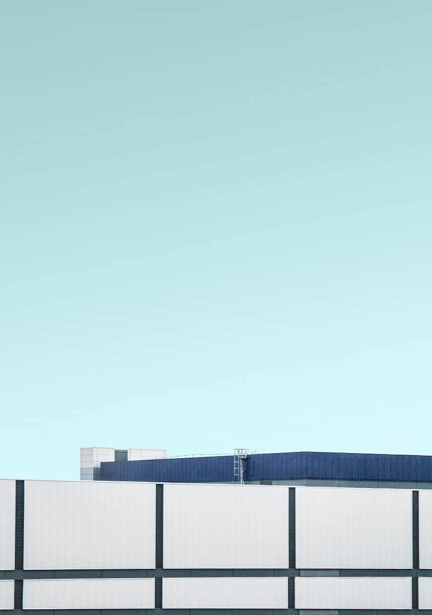 building photo of blue roofed building heathrow airport