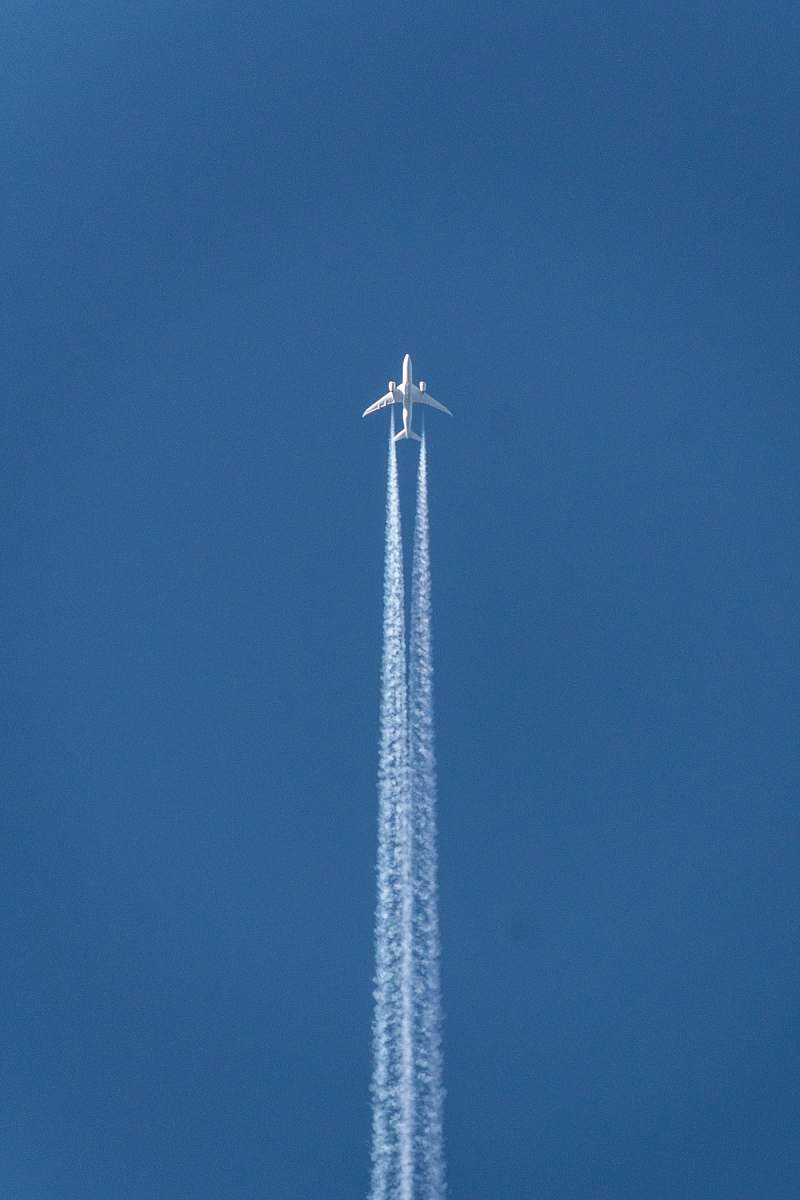 airplane plane doing contrail show transportation