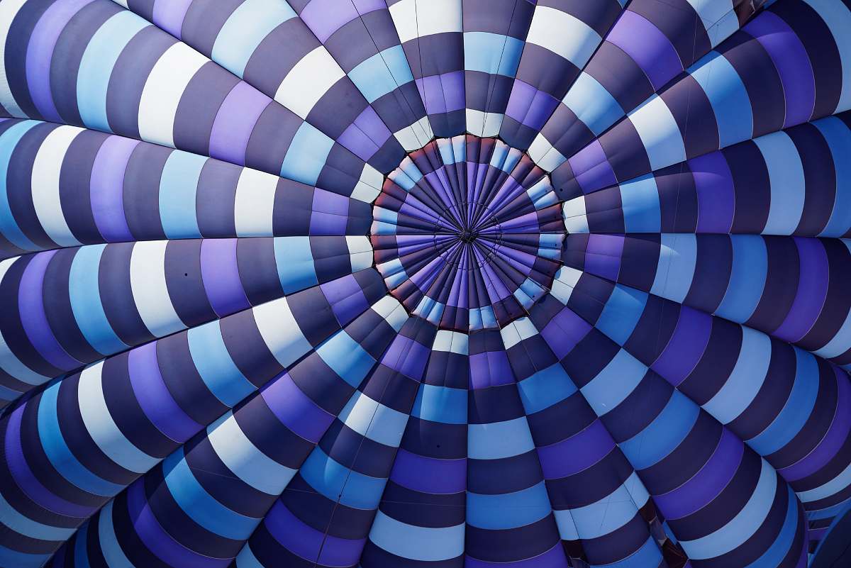 background purple, sky-blue, white, and black stripe textile hot air balloon