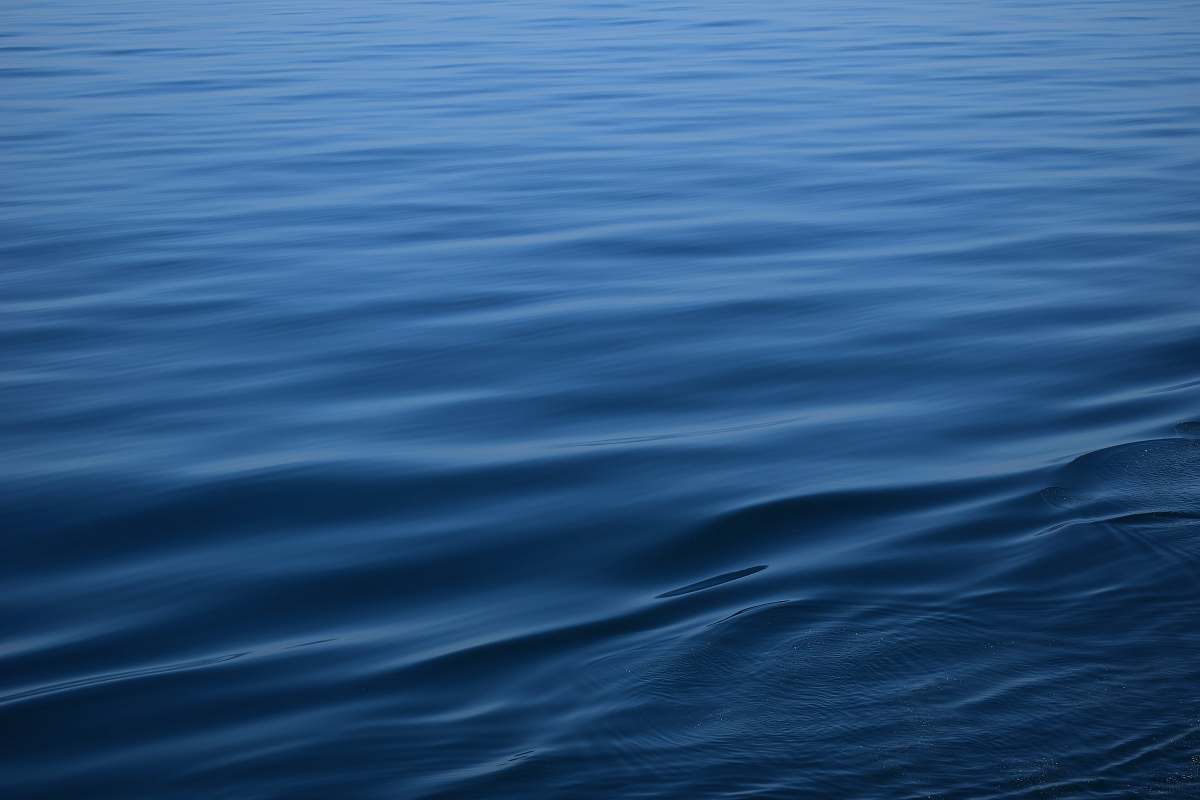 ripple rippling blue body of water water