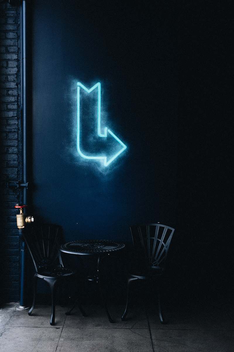 neon round black metal table with chairs chair