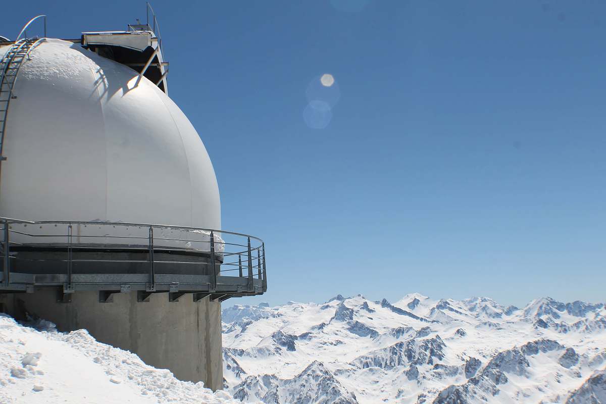 snow round white building structure in snow capped mountain france
