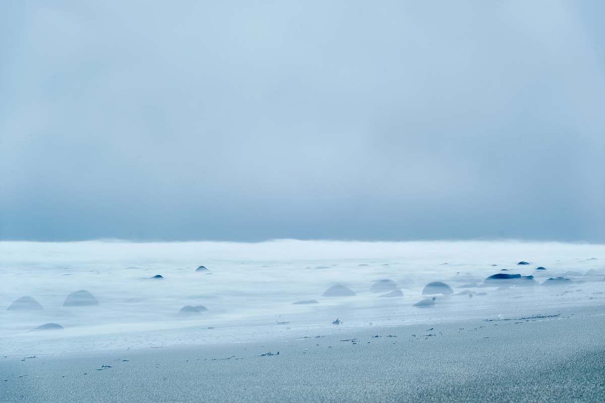 nature sea under cloudy sky outdoors