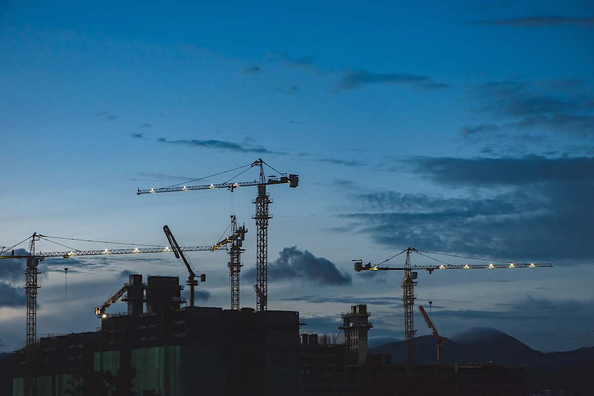 construction several cranes above the buildings crane