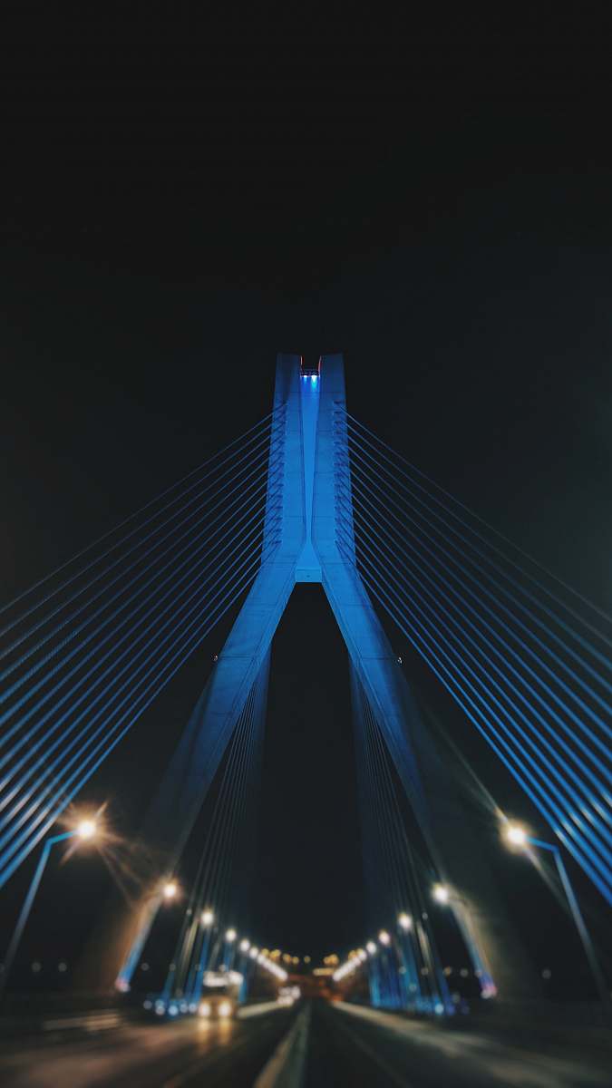 bridge shallow focus photo of bridge night